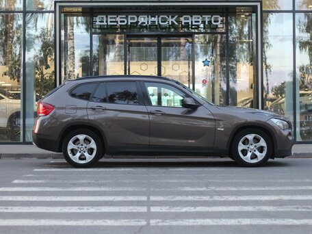 2011 BMW X1 18i I (E84), коричневый, 970000 рублей, вид 4