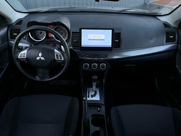 2008 Mitsubishi Lancer X, бежевый - вид 13