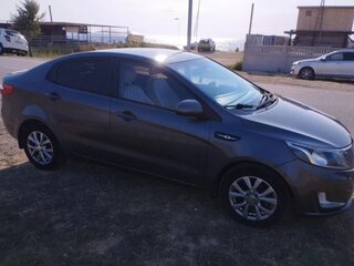 2012 Kia Rio 4-speed III, серый, 819000 рублей, вид 5