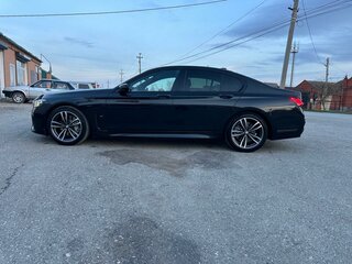 2019 BMW 7 серии 730d xDrive VI (G11/G12) Рестайлинг, чёрный, 4200000 рублей, вид 4