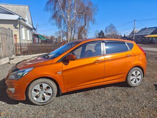 2015 Hyundai Solaris I Рестайлинг, оранжевый, 975000 рублей, вид 3