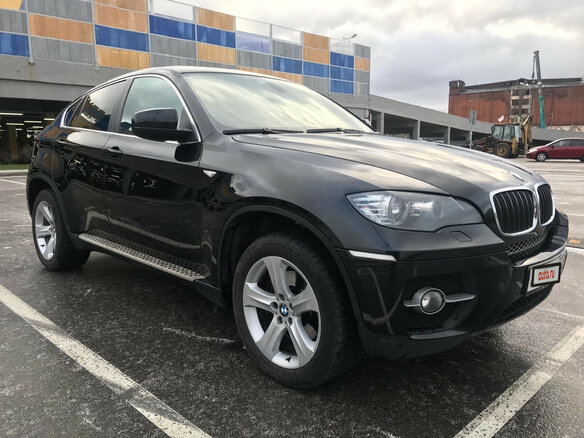 2010 BMW X6 40d I (E71), чёрный - вид 2