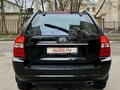 2007 Kia Sportage II, чёрный - вид 3