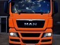 2014 MAN TGX, оранжевый, 3500000 рублей - вид 2