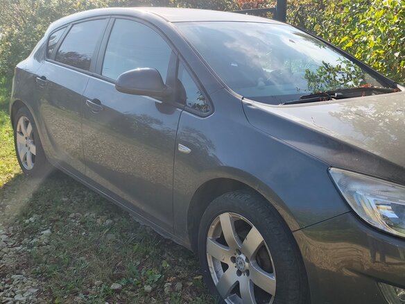2011 Opel Astra J, серый - вид 1