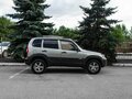 2010 Chevrolet Niva I Рестайлинг, серебристый, 444000 рублей - вид 7