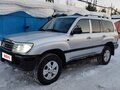 2004 Toyota Land Cruiser 105 100 Series Рестайлинг 1, серебристый