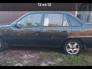 2012 Daewoo Nexia I Рестайлинг, чёрный, 220000 рублей, вид 2