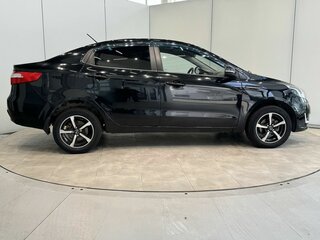 2012 Kia Rio 5-speed III, чёрный, 900000 рублей, вид 4