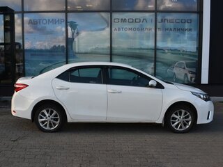 2013 Toyota Corolla XI (E160, E170, E180), белый, 990000 рублей, вид 4