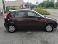 2012 Lada (ВАЗ) Kalina I, пурпурный - вид 1