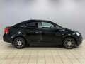 2012 Chevrolet Aveo II, чёрный, 470000 рублей - вид 7