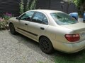 2002 Nissan Almera II (N16) Рестайлинг, золотистый, 339000 рублей - вид 2