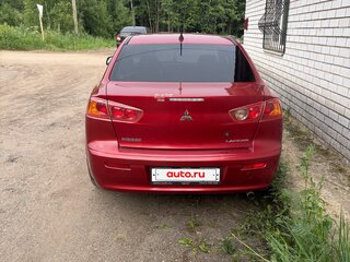 2008 Mitsubishi Lancer X, красный, 750000 рублей, вид 4