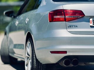 2015 Volkswagen Jetta VI Рестайлинг, серебристый, 1050000 рублей, вид 4