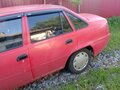 2012 Daewoo Nexia I Рестайлинг, красный, 90000 рублей - вид 2