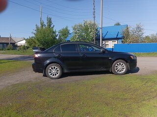 2012 Mitsubishi Lancer X Рестайлинг, чёрный, 1000000 рублей, вид 2