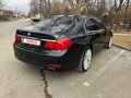 2009 BMW 7 серии 740d V (F01/F02/F04), серый - вид 2