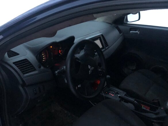 2008 Mitsubishi Lancer X, синий - вид 2