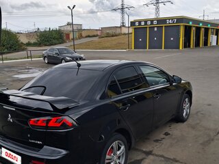 2010 Mitsubishi Lancer X, чёрный, 750000 рублей, вид 3