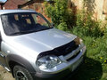 2011 Chevrolet Niva I Рестайлинг, серебристый - вид 2
