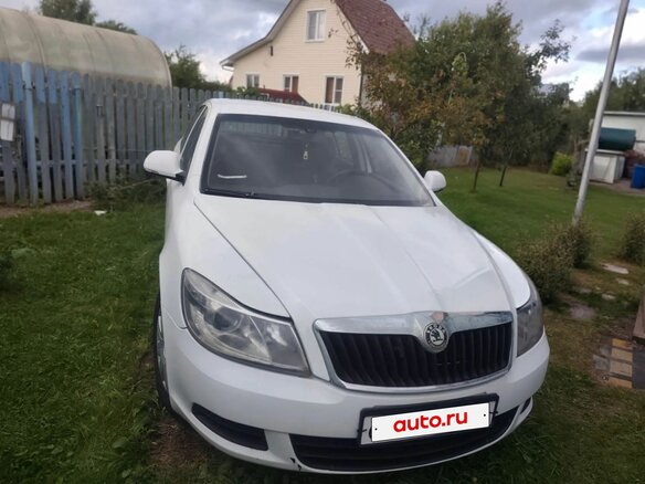 2011 Skoda Octavia II (A5) Рестайлинг, белый - вид 1