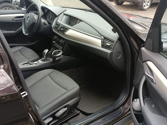 2014 BMW X1 20d I (E84) Рестайлинг, коричневый, 2200000 рублей - вид 5
