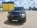 2012 Chevrolet Tahoe 6AT III, чёрный, 2600000 рублей - вид 1