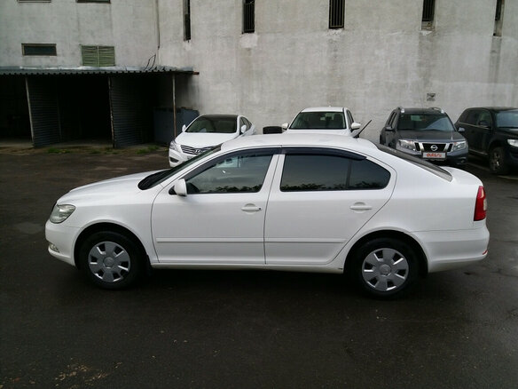 2013 Skoda Octavia II (A5) Рестайлинг, белый - вид 6