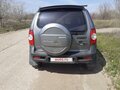 2014 Chevrolet Niva I Рестайлинг, серый, 650000 рублей - вид 1