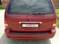 2005 Kia Carnival I Рестайлинг, красный, 550000 рублей - вид 1