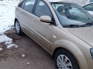 2011 Kia Rio II Рестайлинг, бежевый, 550000 рублей, вид 3