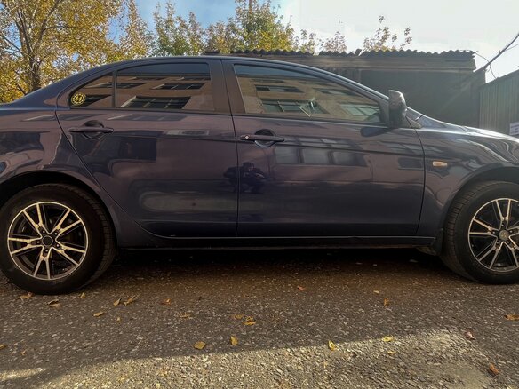 2010 Mitsubishi Lancer X, синий, 900000 рублей - вид 4
