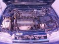 1994 Toyota Sprinter VII (E100), синий - вид 5