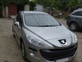 2009 Peugeot 308 I, золотистый - вид 1