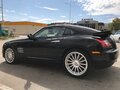 2004 Chrysler Crossfire, чёрный - вид 3