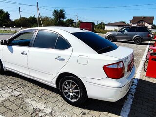 2004 Toyota Premio I (T24) Рестайлинг, белый, 630000 рублей, вид 4