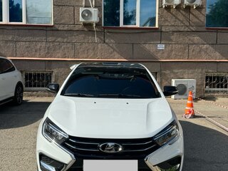 2024 Lada (ВАЗ) Vesta I Рестайлинг (NG), белый, 1700000 рублей, вид 1