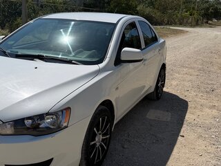 2011 Mitsubishi Lancer X Рестайлинг, белый, 830000 рублей, вид 1