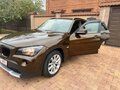 2011 BMW X1 18i I (E84), коричневый, 1450000 рублей - вид 7