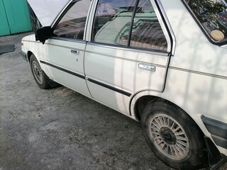 1985 Nissan Sunny B11, белый, 290000 рублей, вид 2