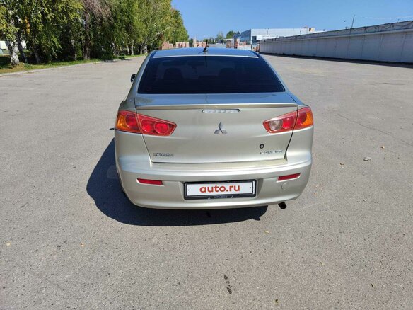 2008 Mitsubishi Lancer X, бежевый, 600000 рублей - вид 1