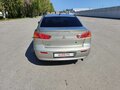 2008 Mitsubishi Lancer X, бежевый, 600000 рублей - вид 1