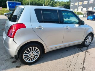 2009 Suzuki Swift III, серебристый, 550000 рублей, вид 4