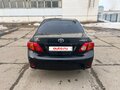 2008 Toyota Corolla X (E140, E150), чёрный, 950000 рублей - вид 1