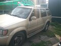1999 Infiniti QX4 I, золотистый - вид 1