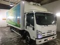 2015 Isuzu Elf (N-series), белый - вид 1