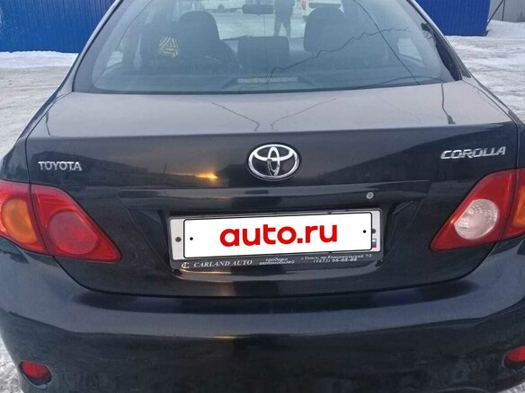2010 Toyota Corolla X (E140, E150), чёрный, 1025000 рублей - вид 3
