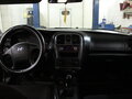 2004 Hyundai Sonata ТагАЗ IV (EF) Рестайлинг, чёрный - вид 2