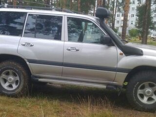 1998 Toyota Land Cruiser 105 100 Series, серебристый, 2000000 рублей, вид 2